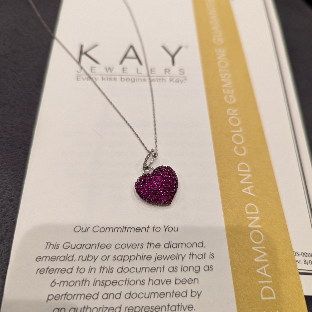 10kt white gold heart pendant with diamonds and lab-made rubies